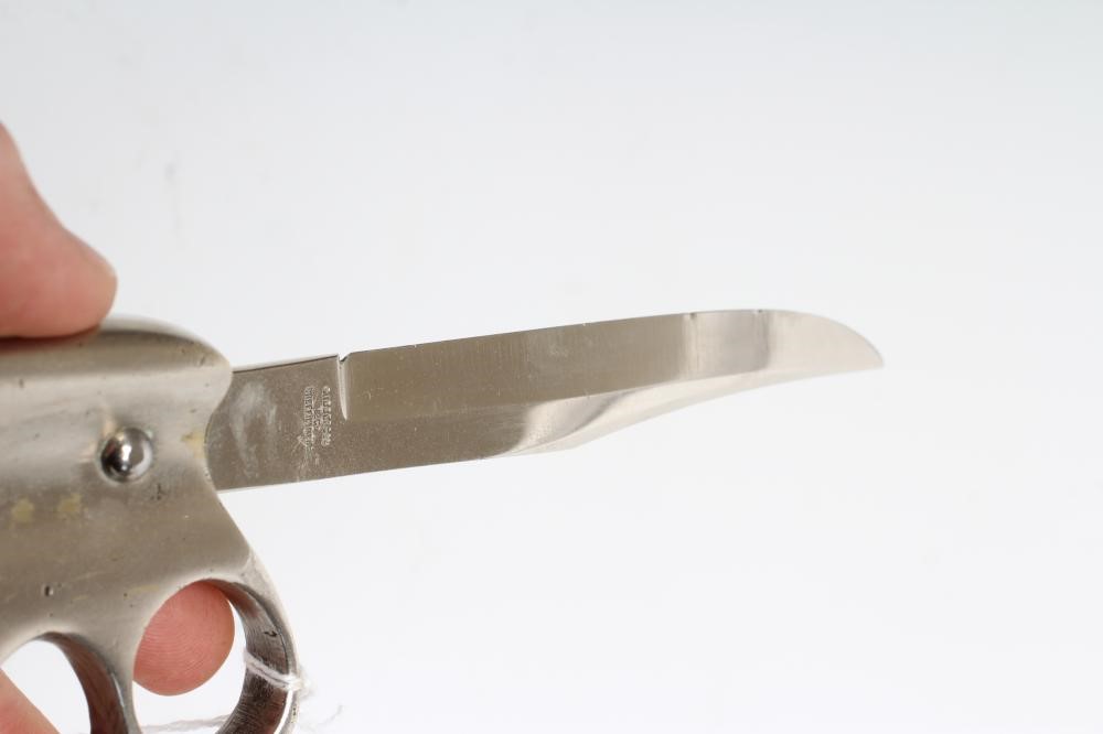 A WWI CLEMENTS KNUCKLE DUSTER KNIFE with 5" clip point blade Image