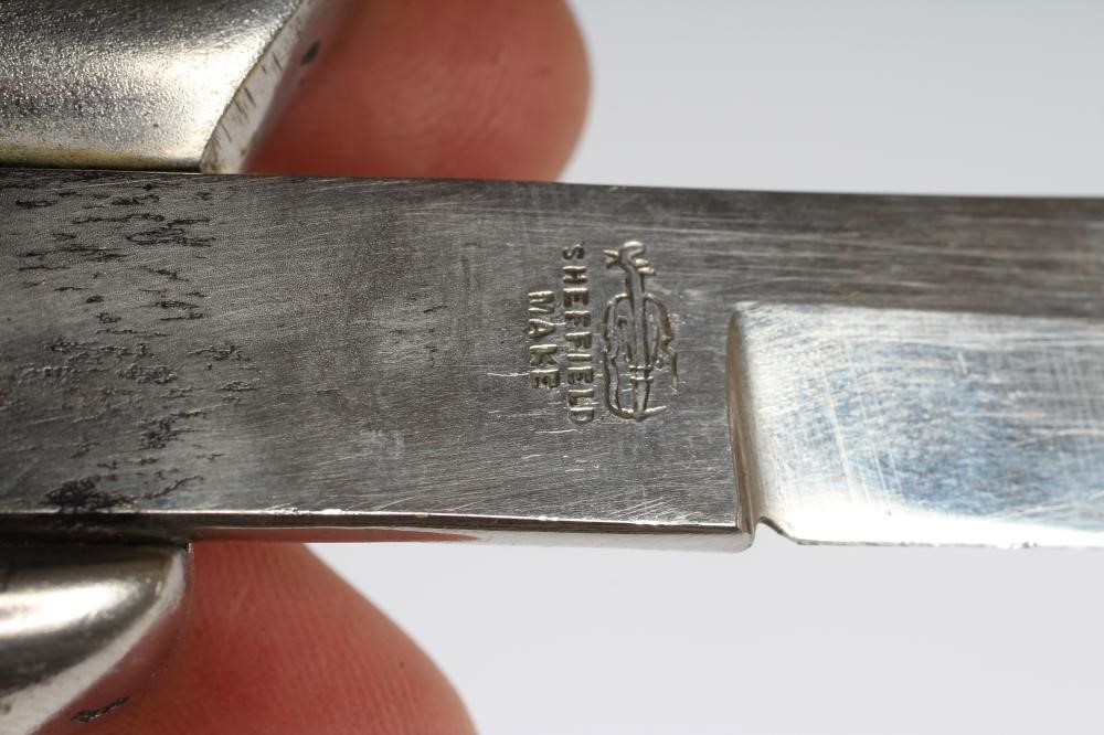 A WWI CLEMENTS KNUCKLE DUSTER KNIFE with 5" clip point blade Image