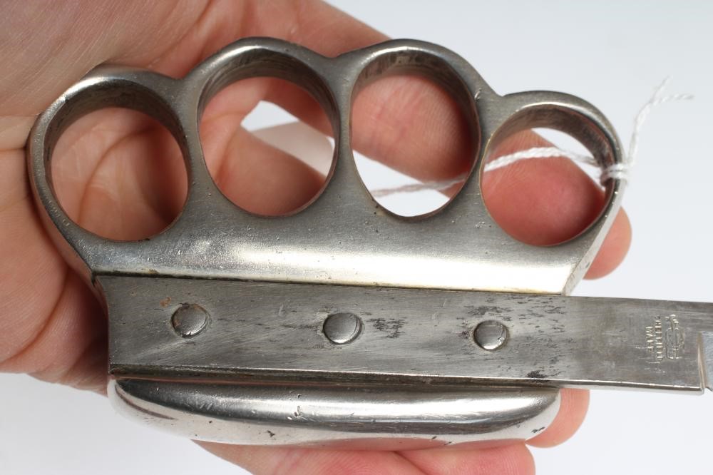 A WWI CLEMENTS KNUCKLE DUSTER KNIFE with 5" clip point blade Image
