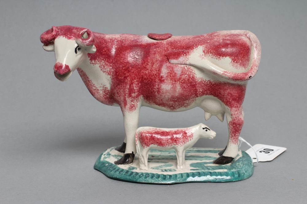 A STAFFORDSHIRE POTTERY COW CREAMER Image