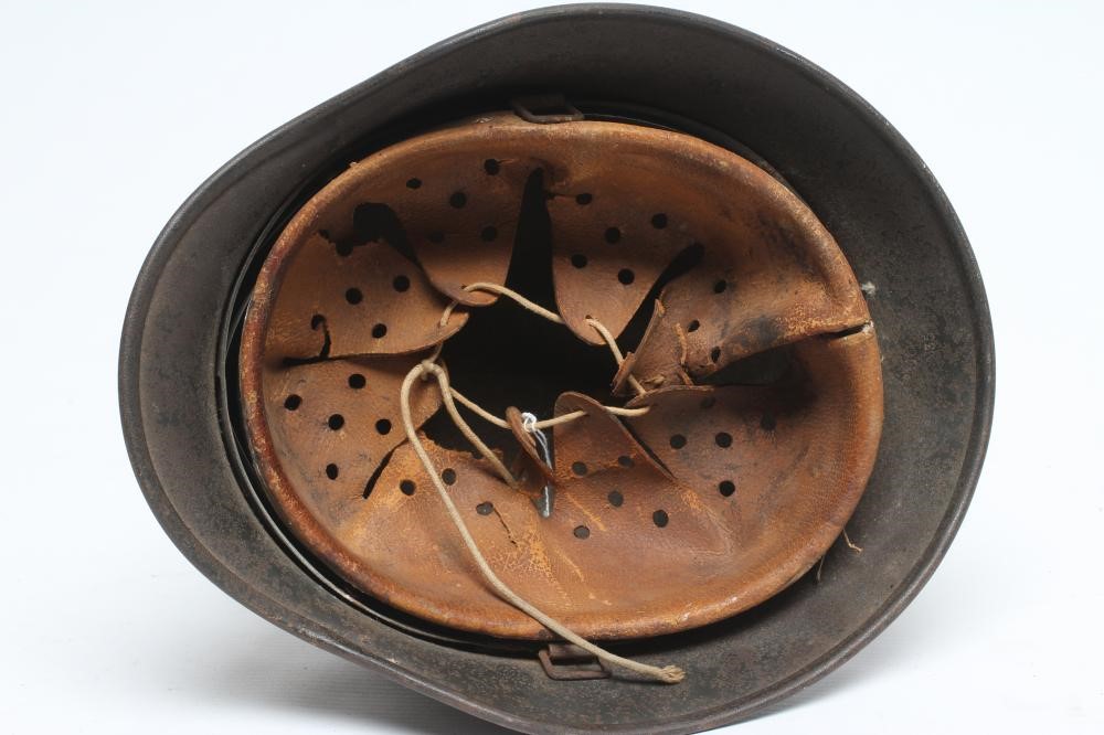 A GERMAN THIRD REICH M35 HELMET of typical form Image