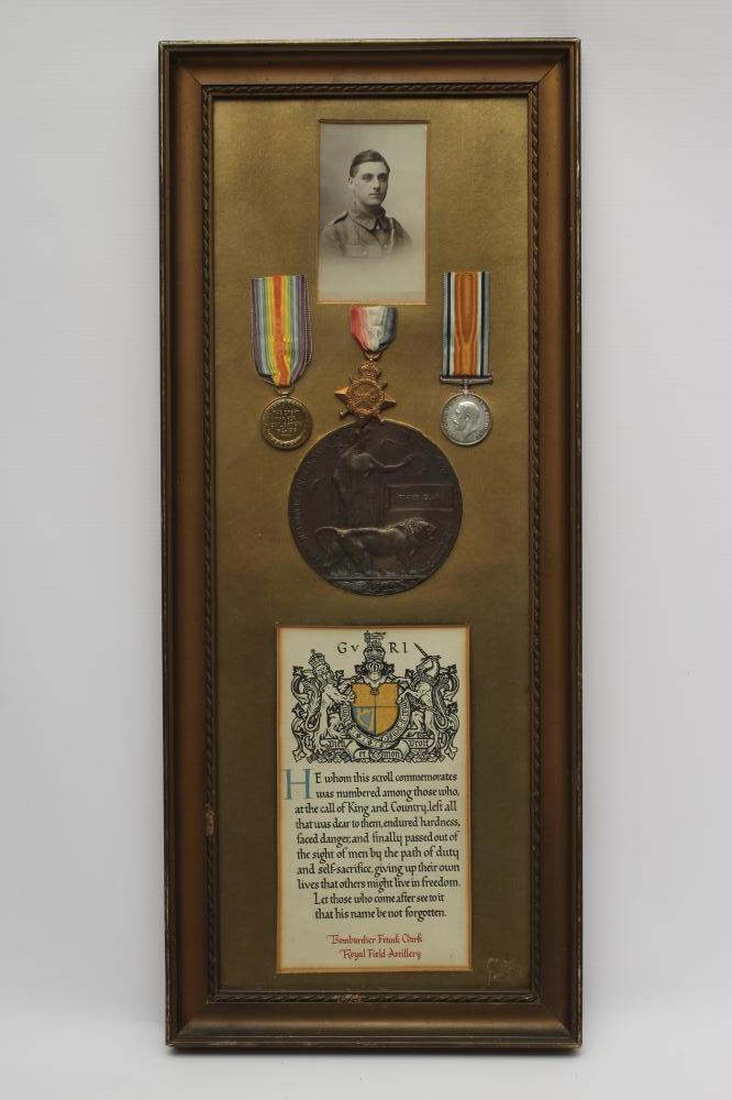 A FRAMED FAMILY OF MEDALS awarded to Bombardier Frank Clark of the Royal Field Artillery Image
