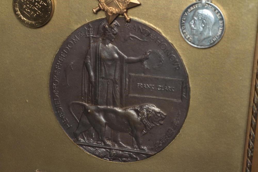 A FRAMED FAMILY OF MEDALS awarded to Bombardier Frank Clark of the Royal Field Artillery Image