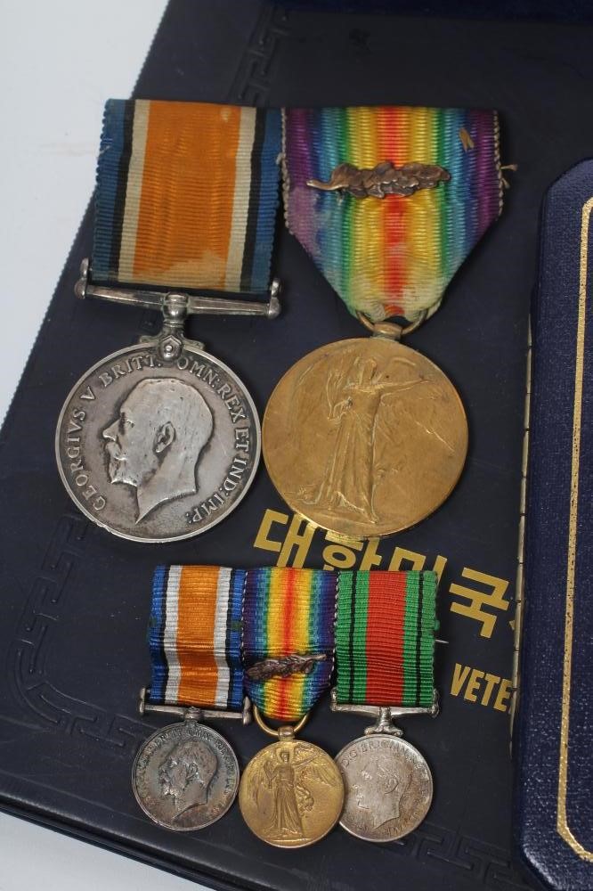 A FAMILY OF MEDALS FOR FATHER AND SON Image