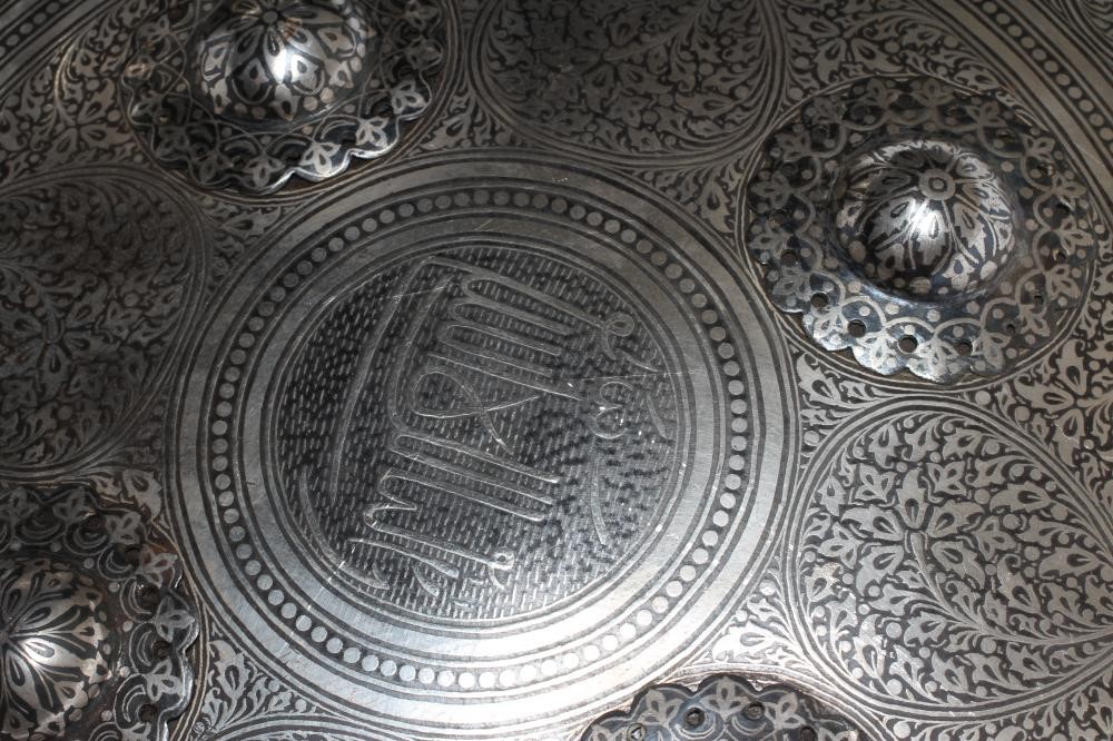 AN INDO-PERSIAN KHULA KHUD HELMET AND SHIELD Image