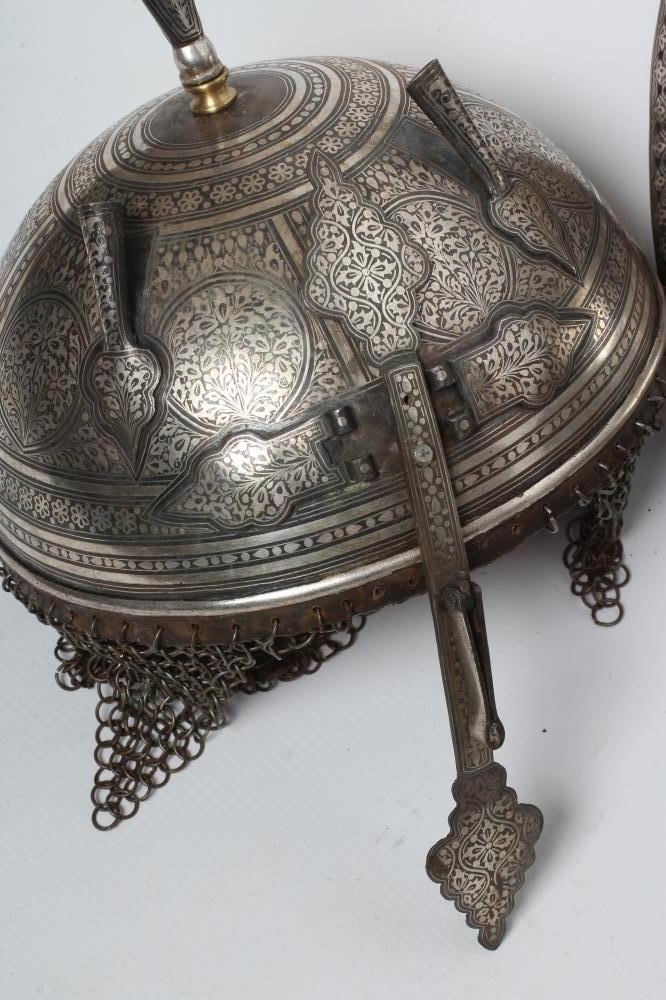 AN INDO-PERSIAN KHULA KHUD HELMET AND SHIELD Image