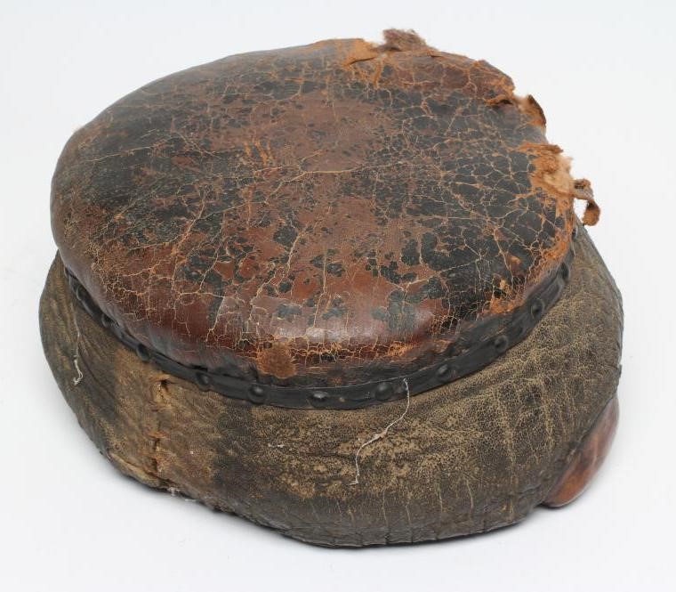 A TAXIDERMY ELEPHANT FOOT STOOL Image