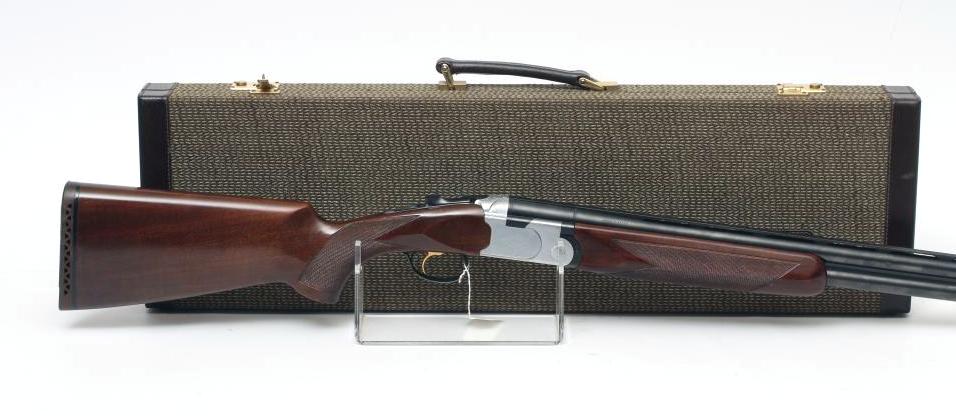 A BREDA 12 BORE OVER & UNDER SHOTGUN Image