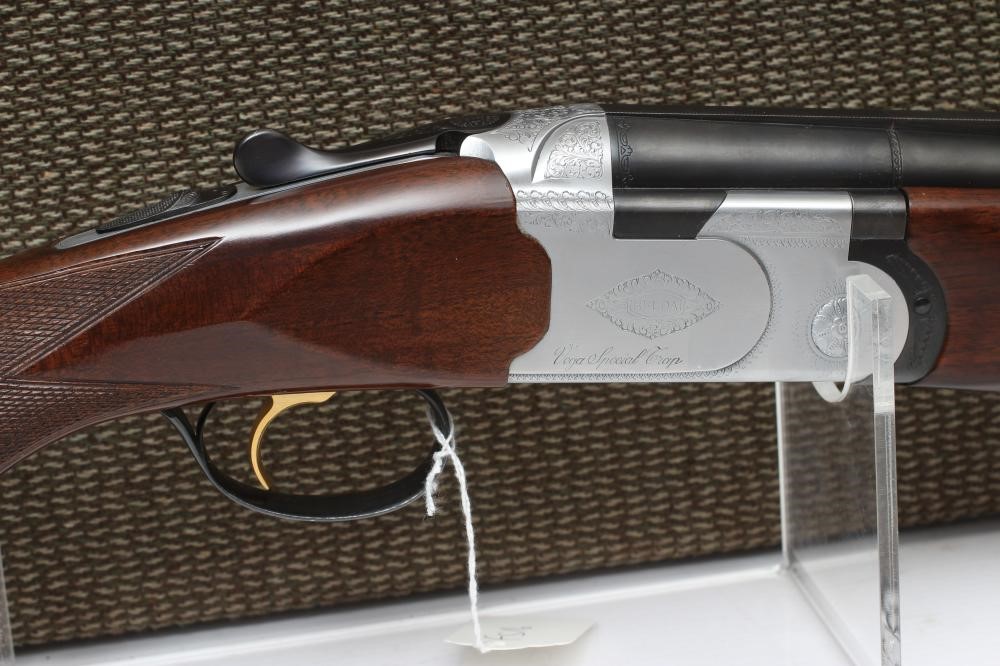 A BREDA 12 BORE OVER & UNDER SHOTGUN Image
