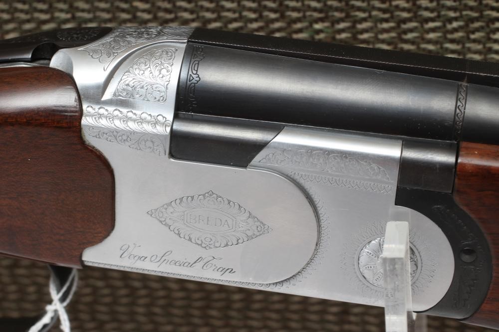 A BREDA 12 BORE OVER & UNDER SHOTGUN Image
