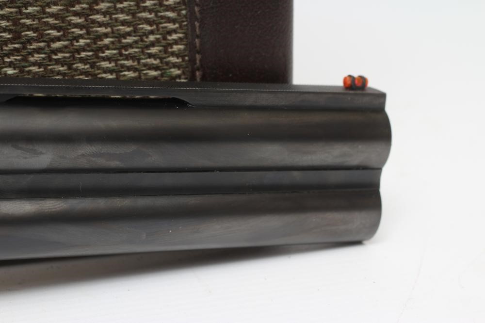 A BREDA 12 BORE OVER & UNDER SHOTGUN Image