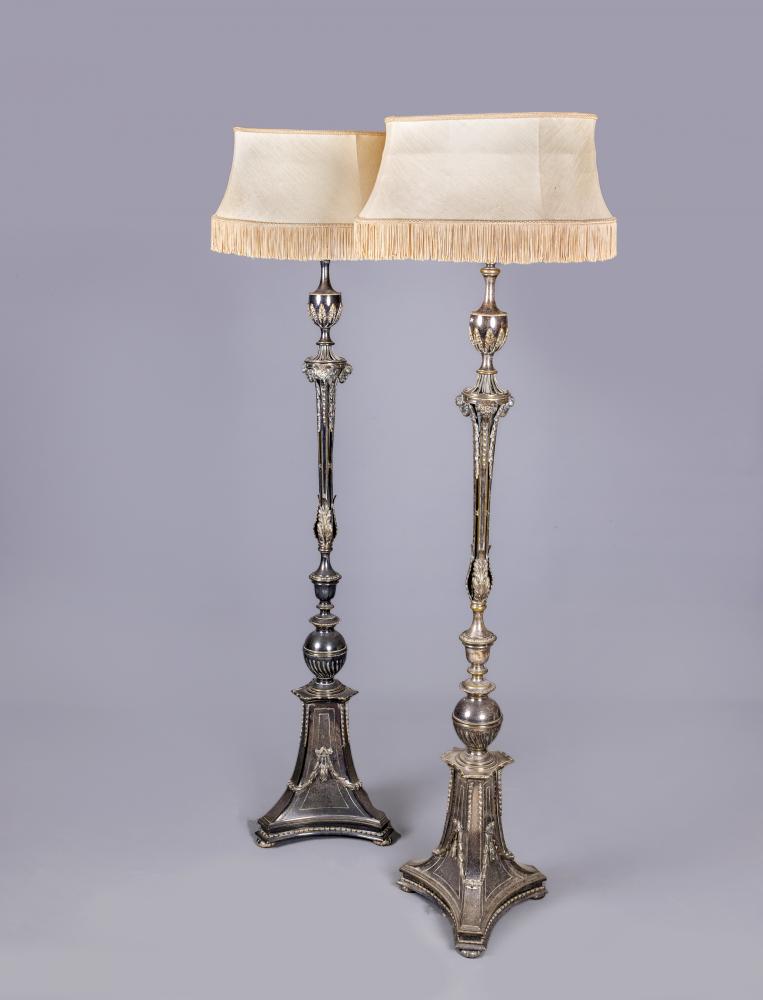 A PAIR OF EDWARDIAN SILVER PLATED STANDARD LAMPS in the neo classical style Image