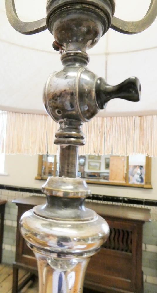 A PAIR OF EDWARDIAN SILVER PLATED STANDARD LAMPS in the neo classical style Image