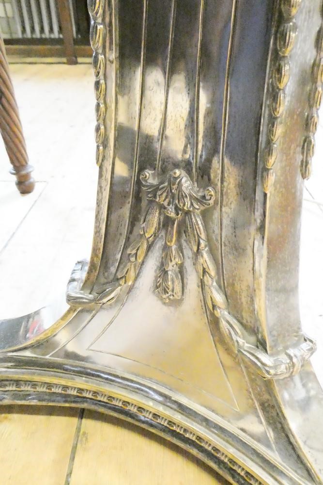 A PAIR OF EDWARDIAN SILVER PLATED STANDARD LAMPS in the neo classical style Image