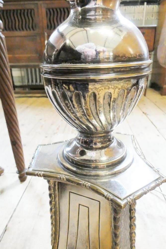 A PAIR OF EDWARDIAN SILVER PLATED STANDARD LAMPS in the neo classical style Image