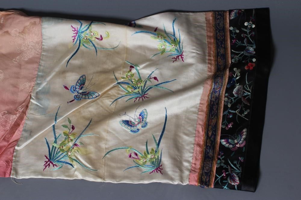 A CHINESE PINK SILK WOVEN ROBE Image
