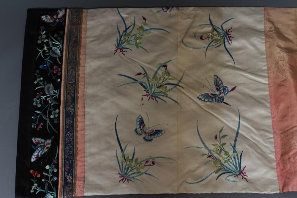 A CHINESE PINK SILK WOVEN ROBE Image