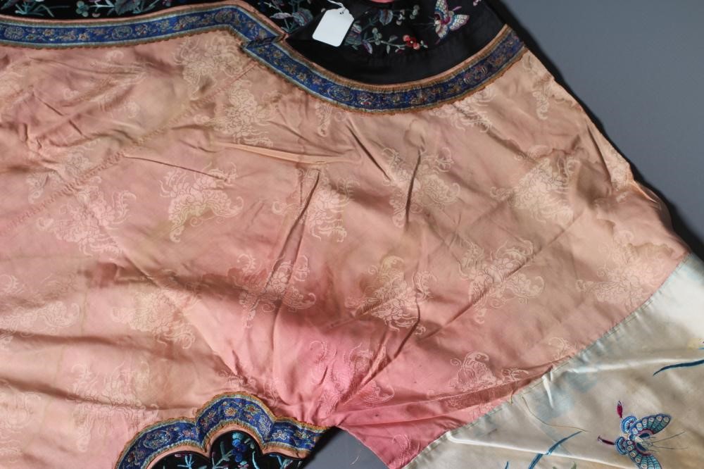 A CHINESE PINK SILK WOVEN ROBE Image