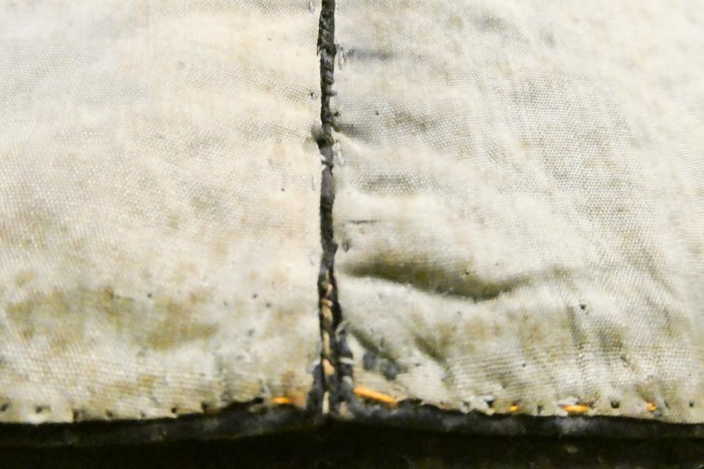 A PAIR OF CHINESE SILK SQUARE PANELS embroidered in coloured silks on a dark navy ground Image