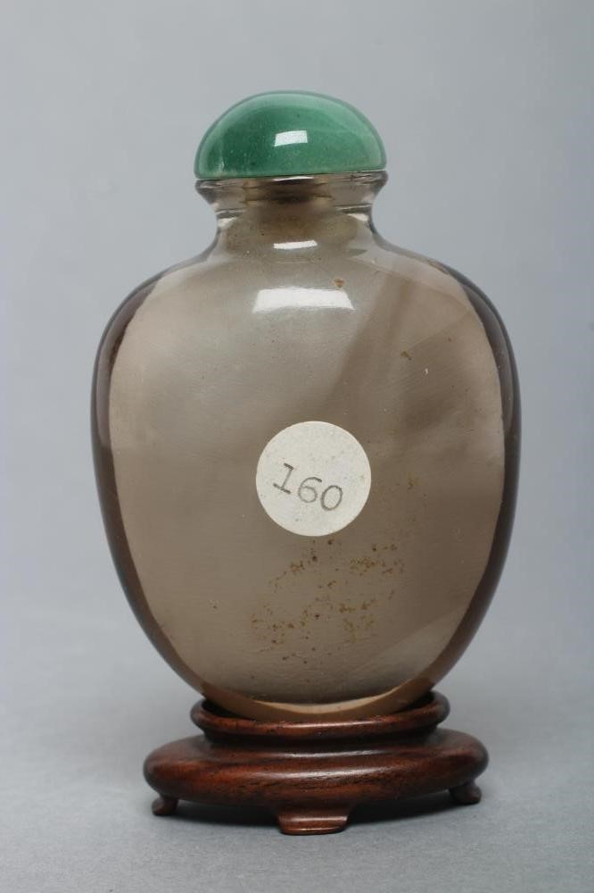 A CHINESE SMOKY CRYSTAL SNUFF BOTTLE Image