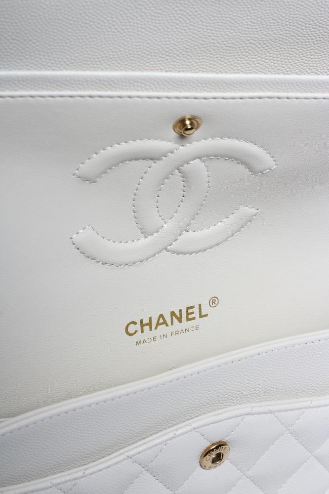 A CHANEL WHITE "CAVIAR" LEATHER QUILTED CLASSIC HANDBAG Image