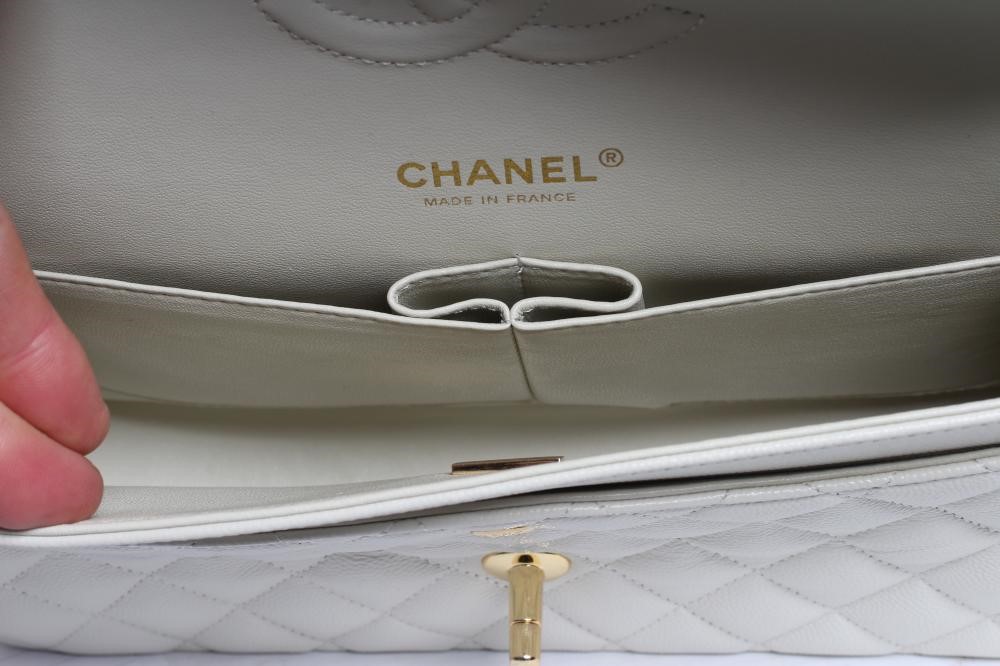 A CHANEL WHITE "CAVIAR" LEATHER QUILTED CLASSIC HANDBAG Image