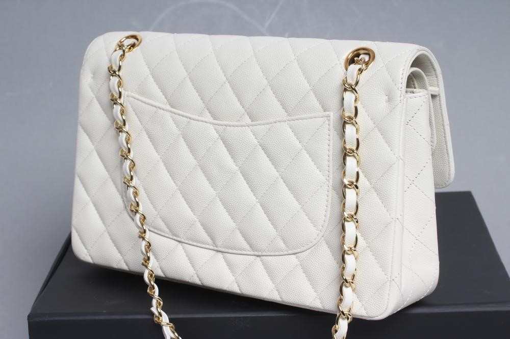 A CHANEL WHITE "CAVIAR" LEATHER QUILTED CLASSIC HANDBAG Image