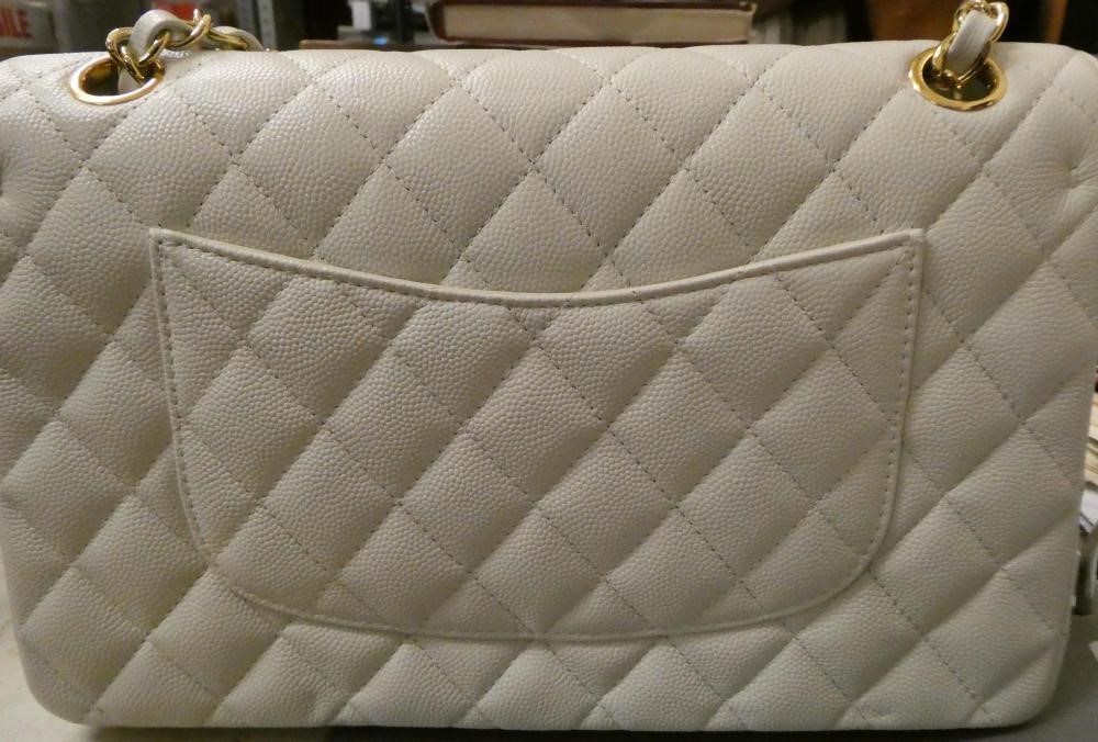 A CHANEL WHITE "CAVIAR" LEATHER QUILTED CLASSIC HANDBAG Image