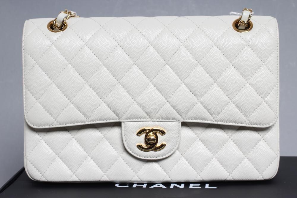A CHANEL WHITE "CAVIAR" LEATHER QUILTED CLASSIC HANDBAG Image