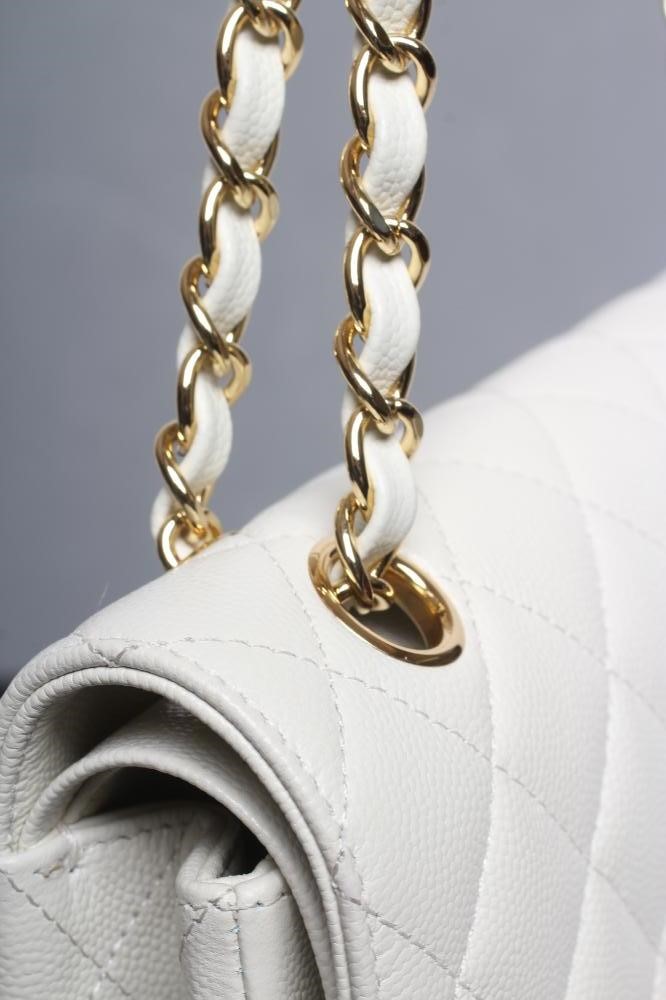 A CHANEL WHITE "CAVIAR" LEATHER QUILTED CLASSIC HANDBAG Image