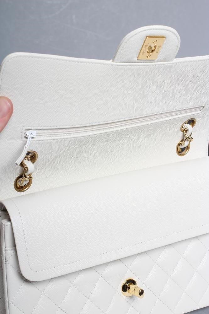 A CHANEL WHITE "CAVIAR" LEATHER QUILTED CLASSIC HANDBAG Image