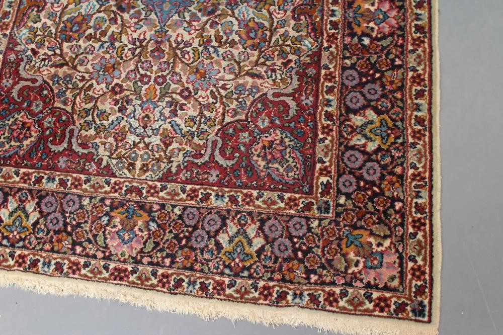A PERSIAN RUG Image
