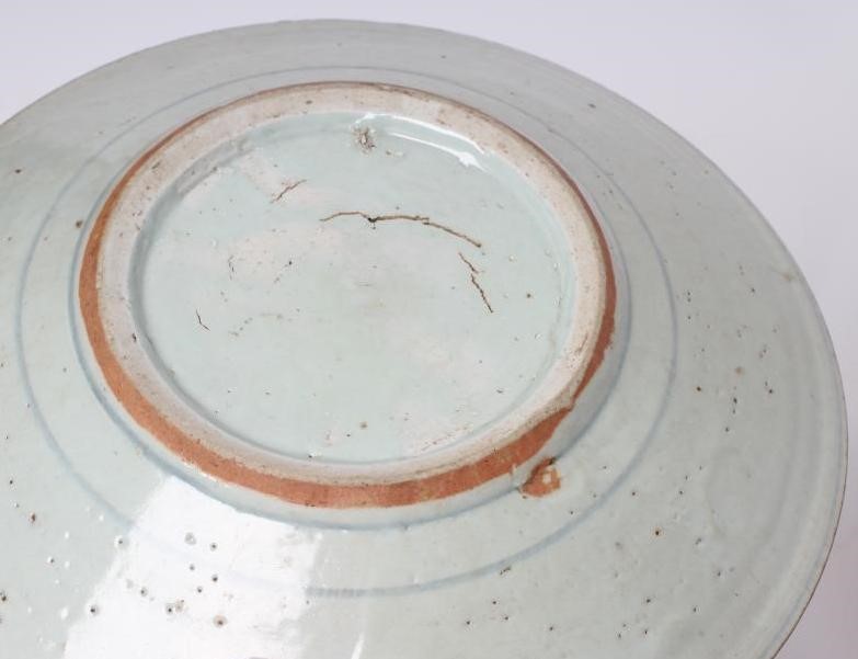 A CHINESE PROVINCIAL STONEWARE BOWL of plain circular form Image