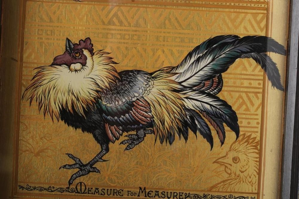 AN AESTHETIC PAINTED WOOD PANEL of oblong form and depicting two fighting cocks on a gilded Image