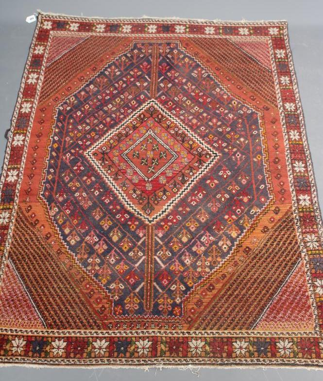 A PERSIAN RUG Image
