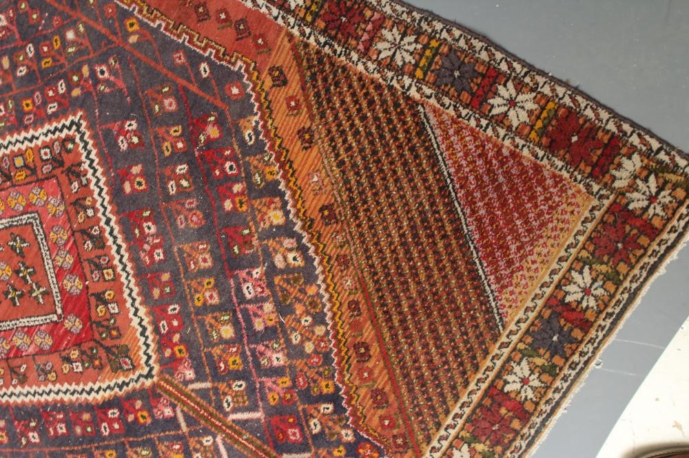 A PERSIAN RUG Image