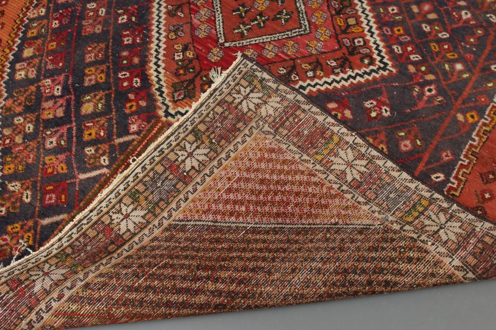 A PERSIAN RUG Image