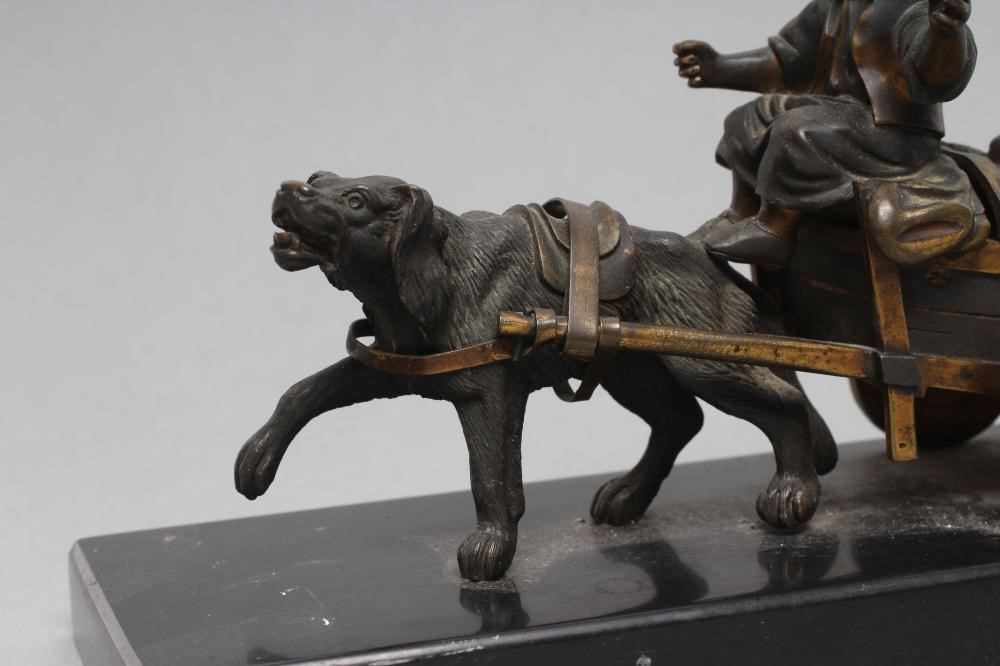 A BRONZED AND PARCEL GILT INKWELL Image