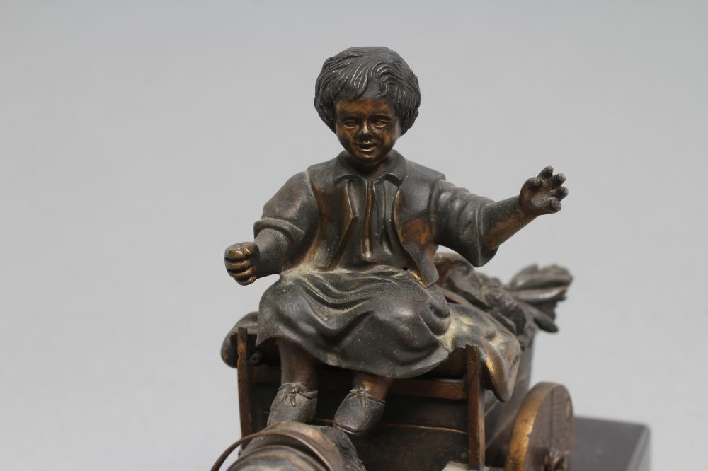 A BRONZED AND PARCEL GILT INKWELL Image