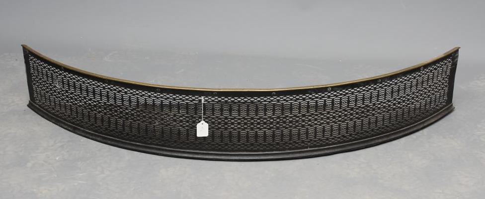 A GEORGIAN CUT STEEL FENDER Image