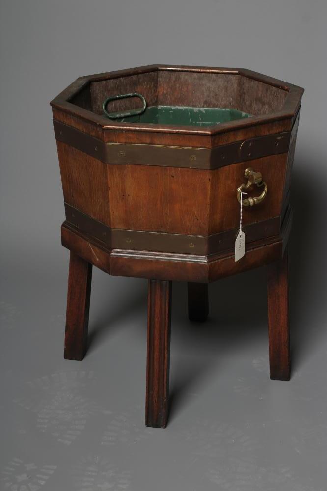 A MAHOGANY AND BRASS BOUND JARDINIERE Image