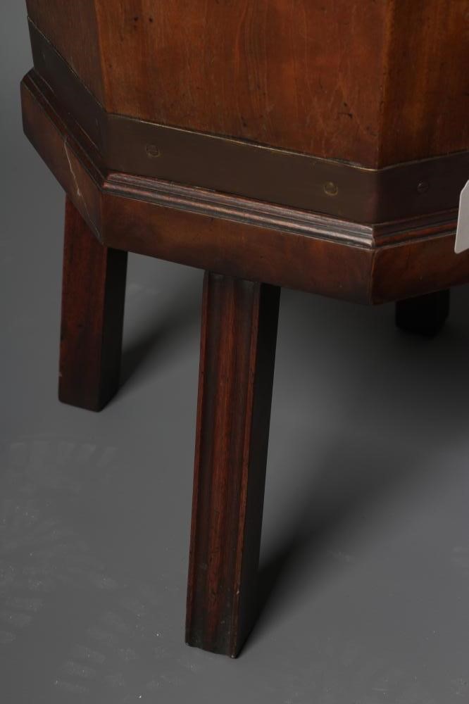 A MAHOGANY AND BRASS BOUND JARDINIERE Image