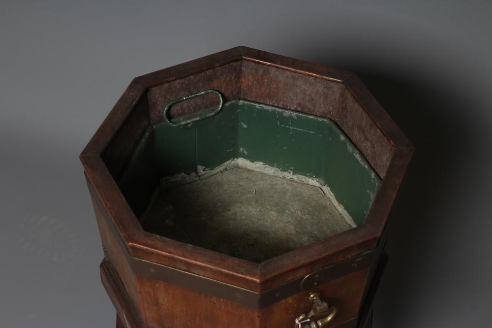 A MAHOGANY AND BRASS BOUND JARDINIERE Image