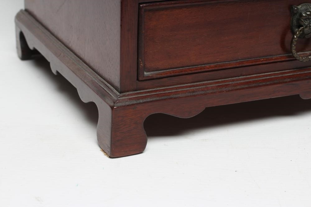 A LATE VICTORIAN MAHOGANY MINIATURE CHEST Image