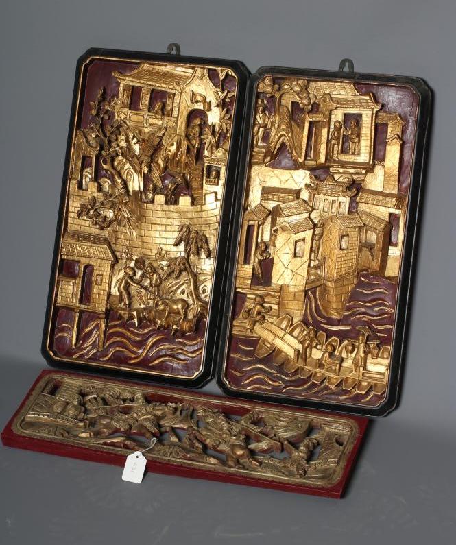 A PAIR OF CHINESE RELIEF CARVED WOOD PANELS Image
