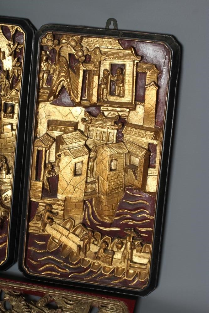 A PAIR OF CHINESE RELIEF CARVED WOOD PANELS Image