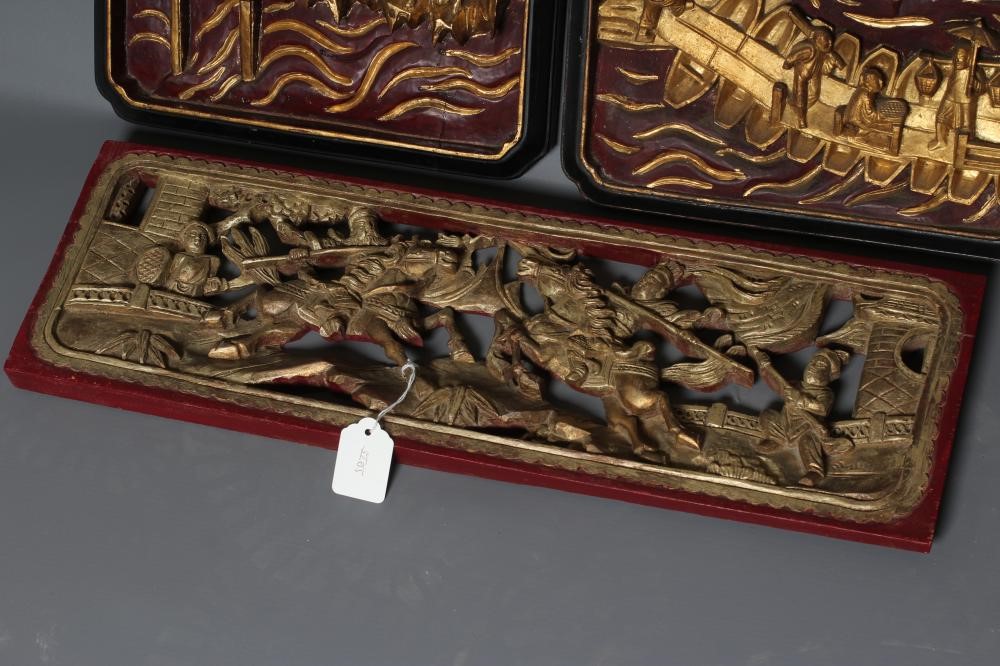 A PAIR OF CHINESE RELIEF CARVED WOOD PANELS Image