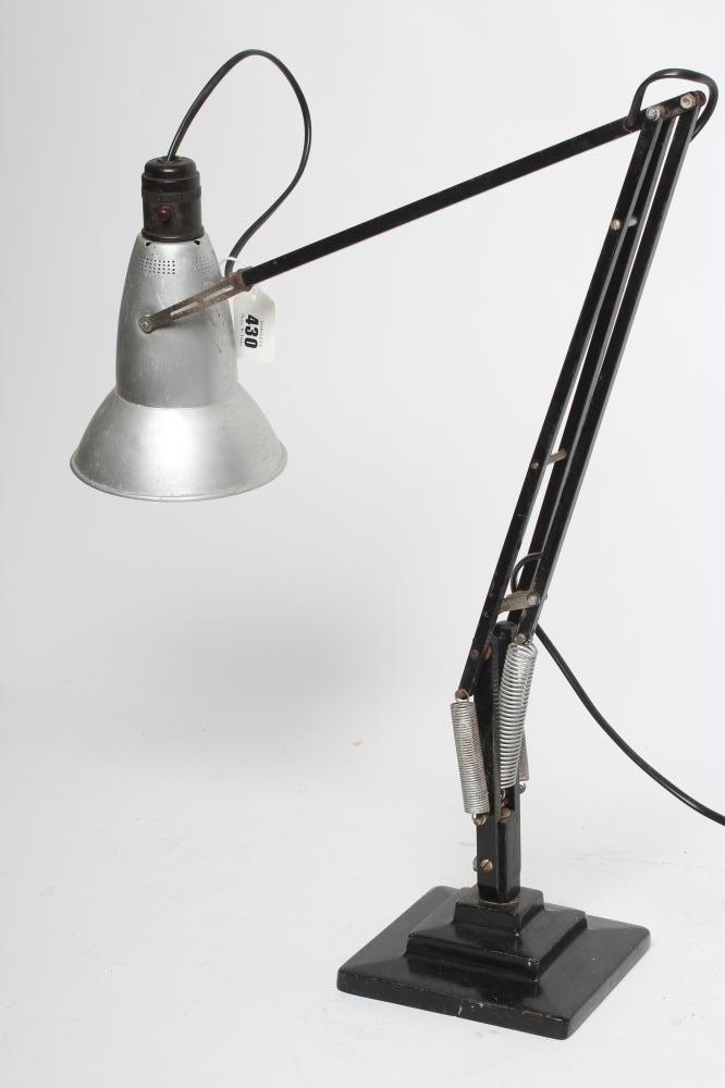 A BLACK ANGLE POISE DESK LAMP Image