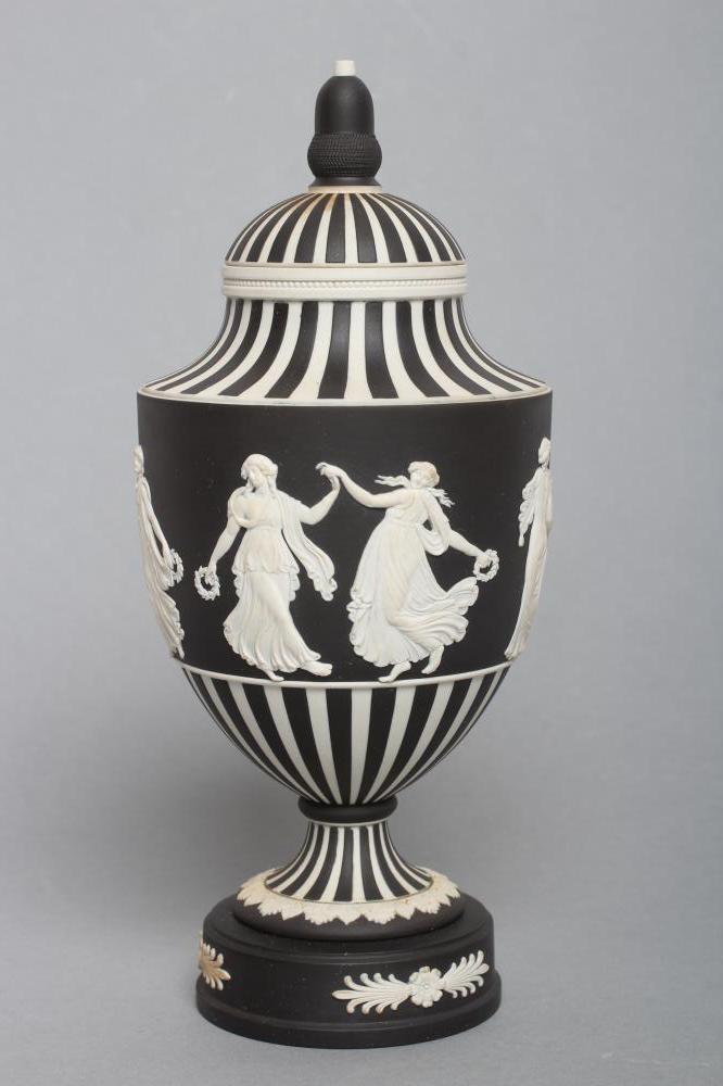 A WEDGWOOD BLACK JASPER DIP "DANCING HOURS" URN AND COVER Image