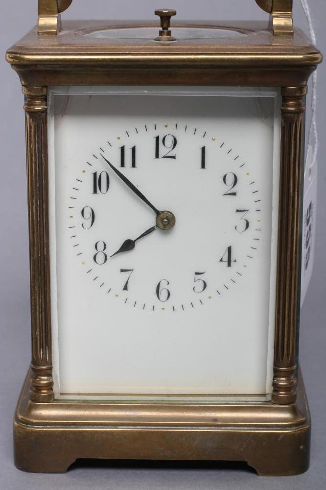 A BRASS CASED CARRIAGE CLOCK Image